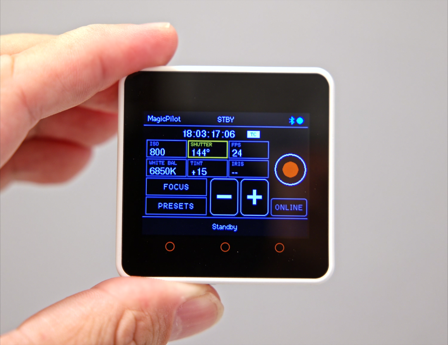 MagicPilot Remote on an M5Stack Core2 showing live ISO, shutter angle, FPS, white balance, tint, iris and timecode from a Blackmagic Pocket Cinema Camera 6K